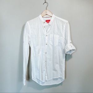 Shirt with roll sleeve tabs